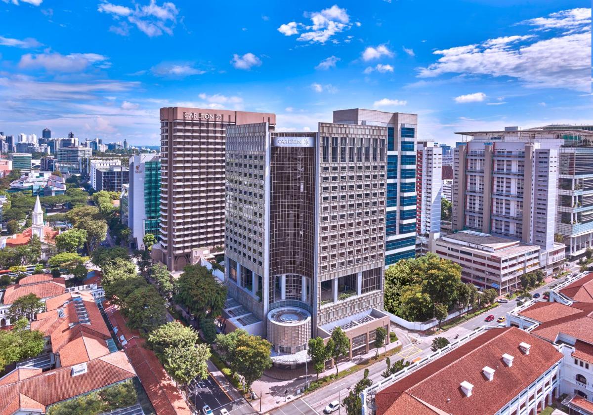 an aerial view of a city with buildings at Carlton Hotel Singapore in Singapore an aerial view of a city with buildings at Carlton Hotel Singapore in Singapore