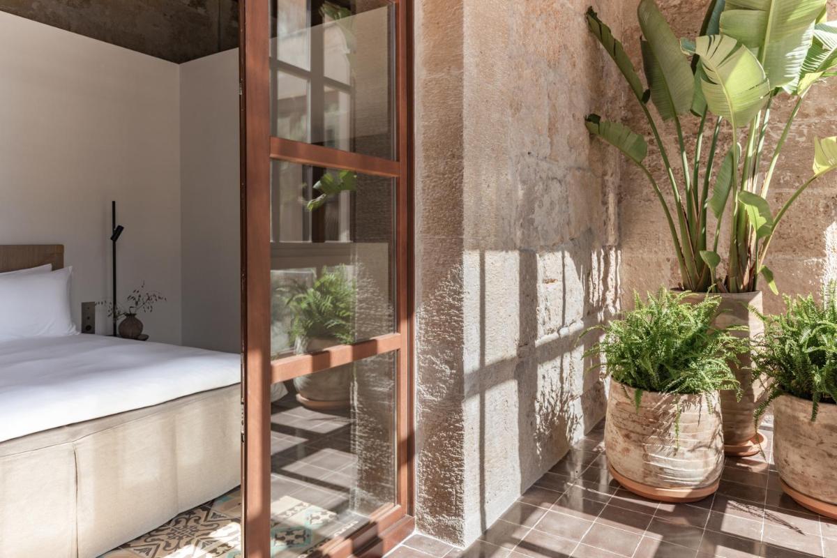 Cama o camas de una habitación en Nobis Hotel Palma, a Member of Design Hotels