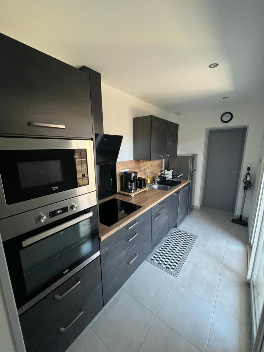Maison chaleureuse avec terrasse privative proche de la gare et du centre-ville - Housity