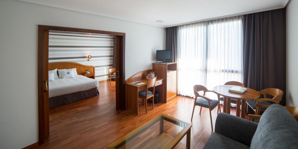 Cama o camas de una habitación en Laias Caldaria hotel y Balneario