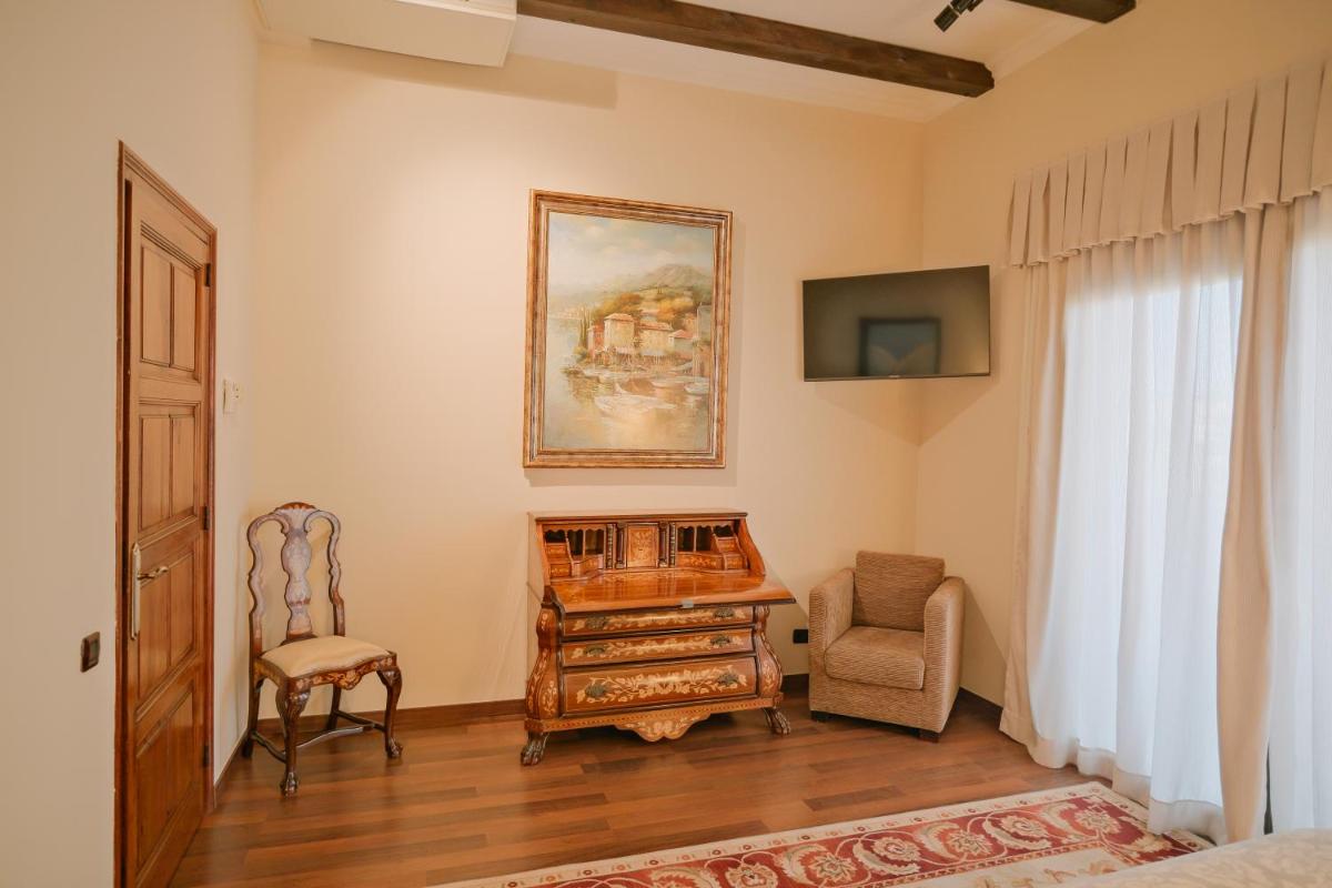 Una televisión o centro de entretenimiento en Rigat Park & Spa Hotel - Adults Recommended