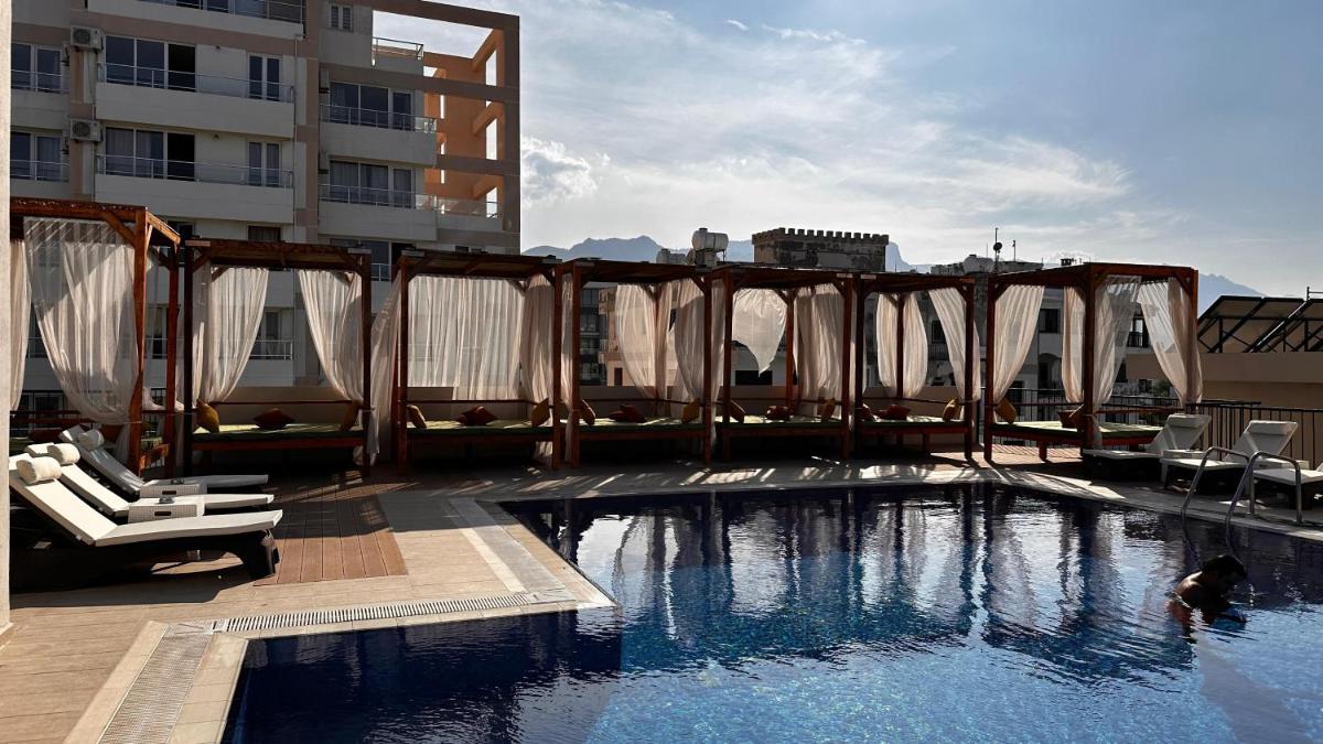 Olivia Palm Hotel - Housity