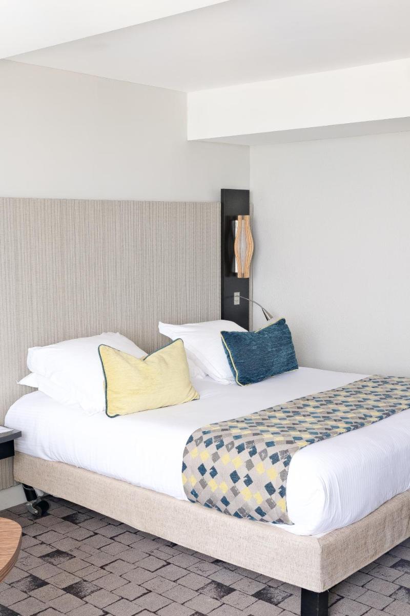 Un ou plusieurs lits dans un hébergement de l'établissement Thalazur Port-Camargue - Hotel & Spa