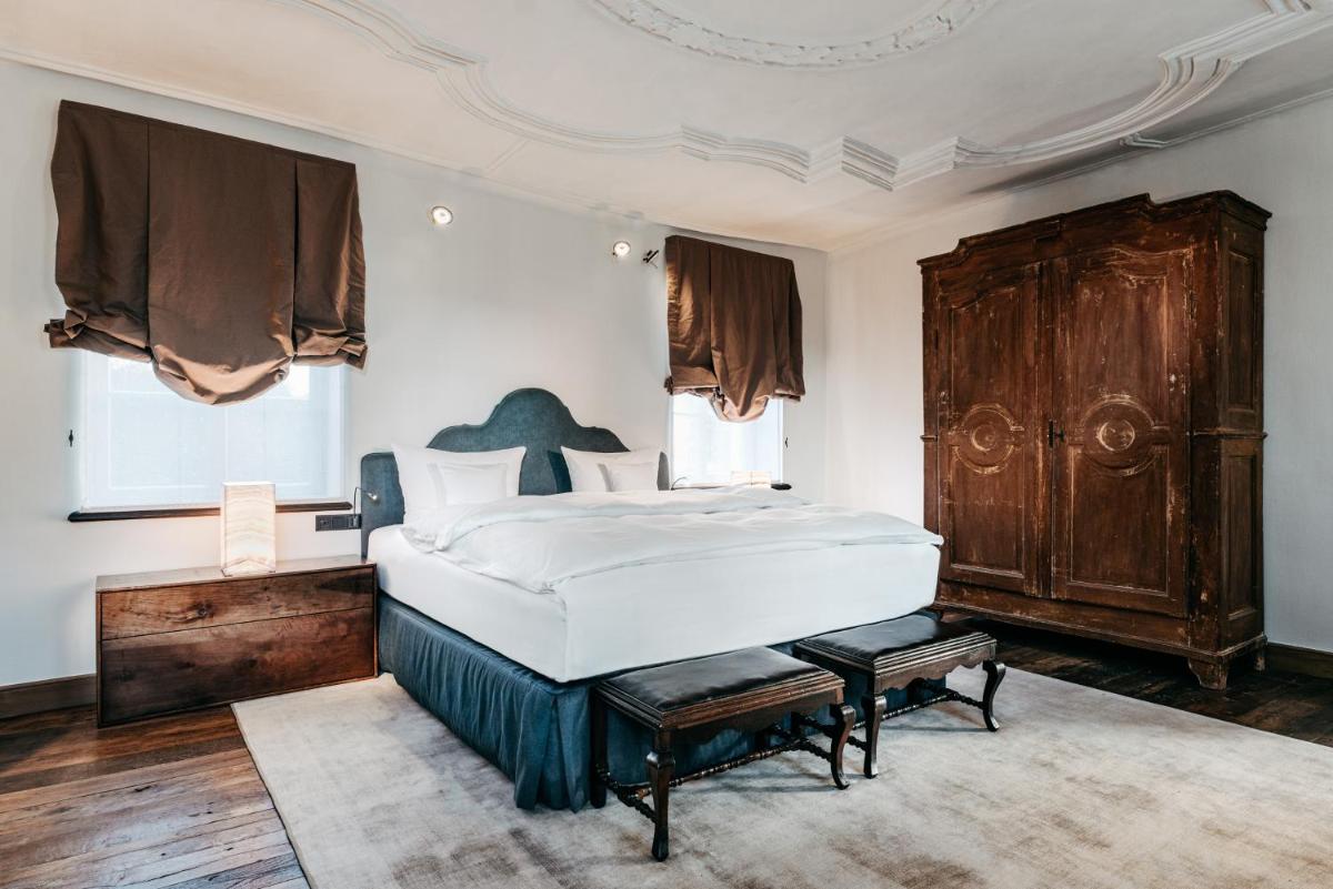 Ein Bett oder Betten in einem Zimmer der Unterkunft Hotel PURS