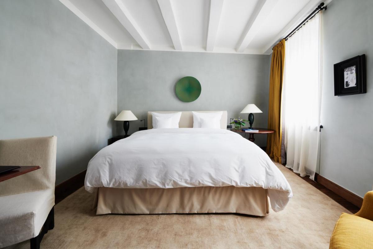 Ein Bett oder Betten in einem Zimmer der Unterkunft Hotel PURS