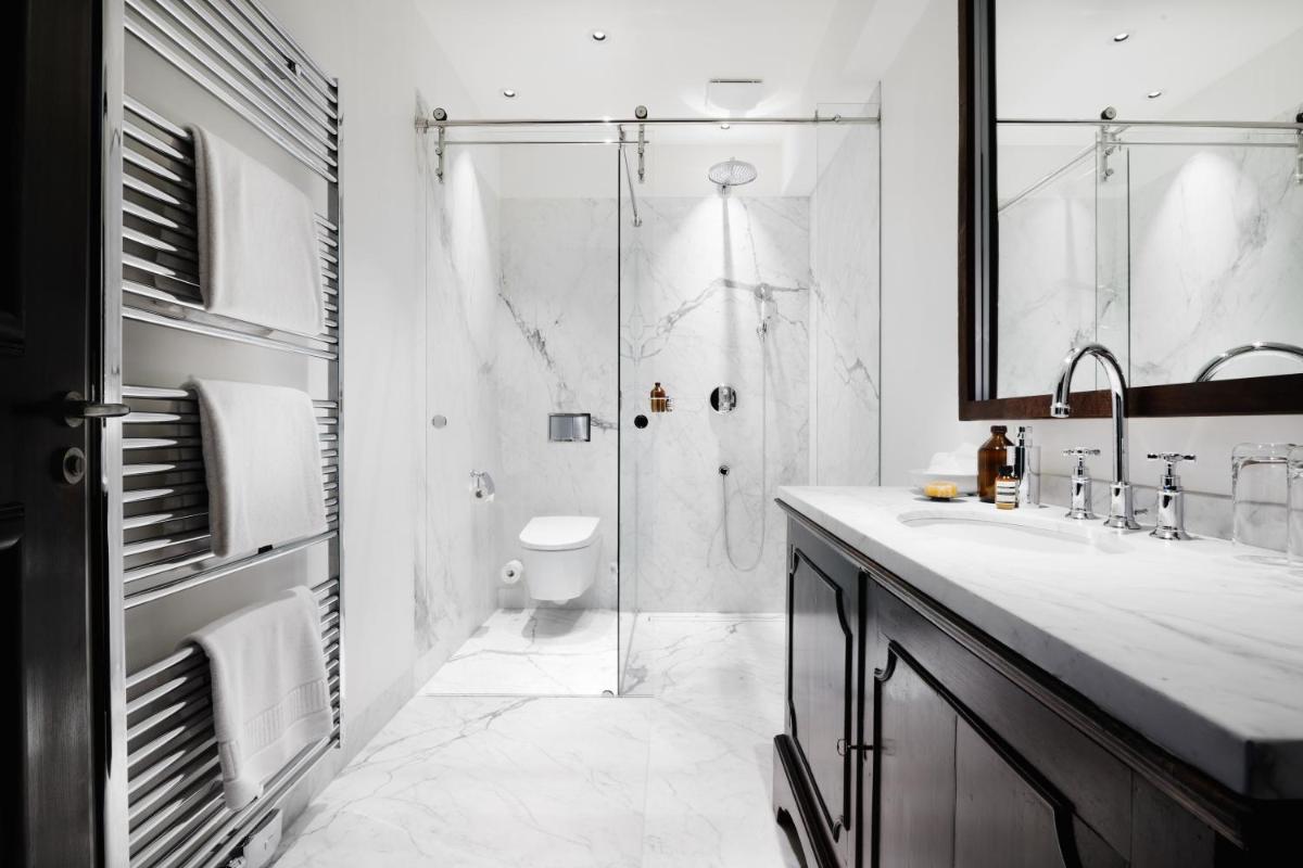 Ein Badezimmer in der Unterkunft Hotel PURS