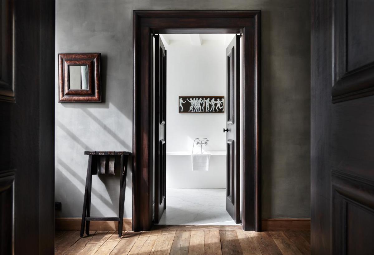 Ein Badezimmer in der Unterkunft Hotel PURS