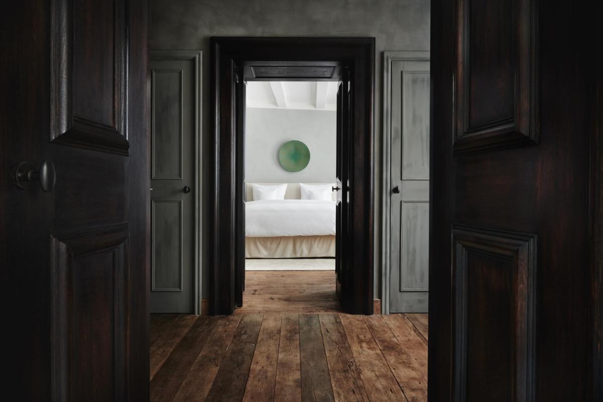 Ein Bett oder Betten in einem Zimmer der Unterkunft Hotel PURS