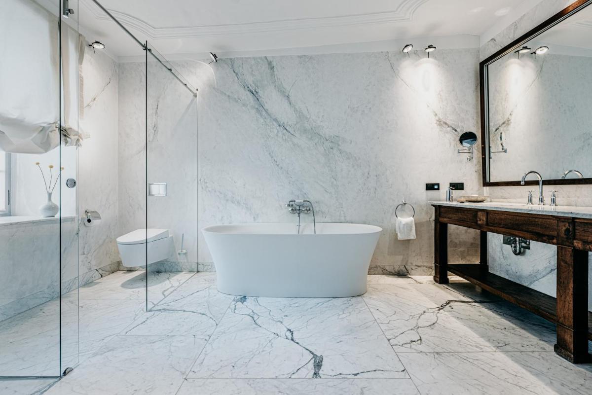 Ein Badezimmer in der Unterkunft Hotel PURS