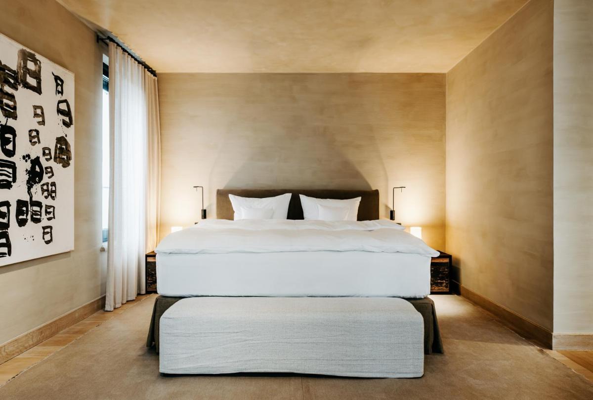 Ein Bett oder Betten in einem Zimmer der Unterkunft Hotel PURS