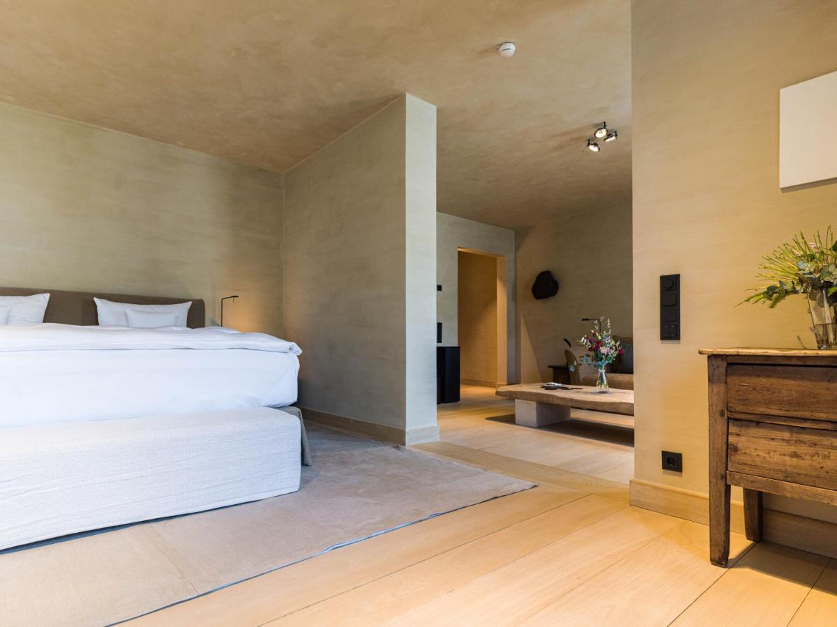 Ein Bett oder Betten in einem Zimmer der Unterkunft Hotel PURS