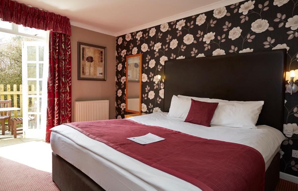 Royal George Hotel by Greene King Inns - Housity
