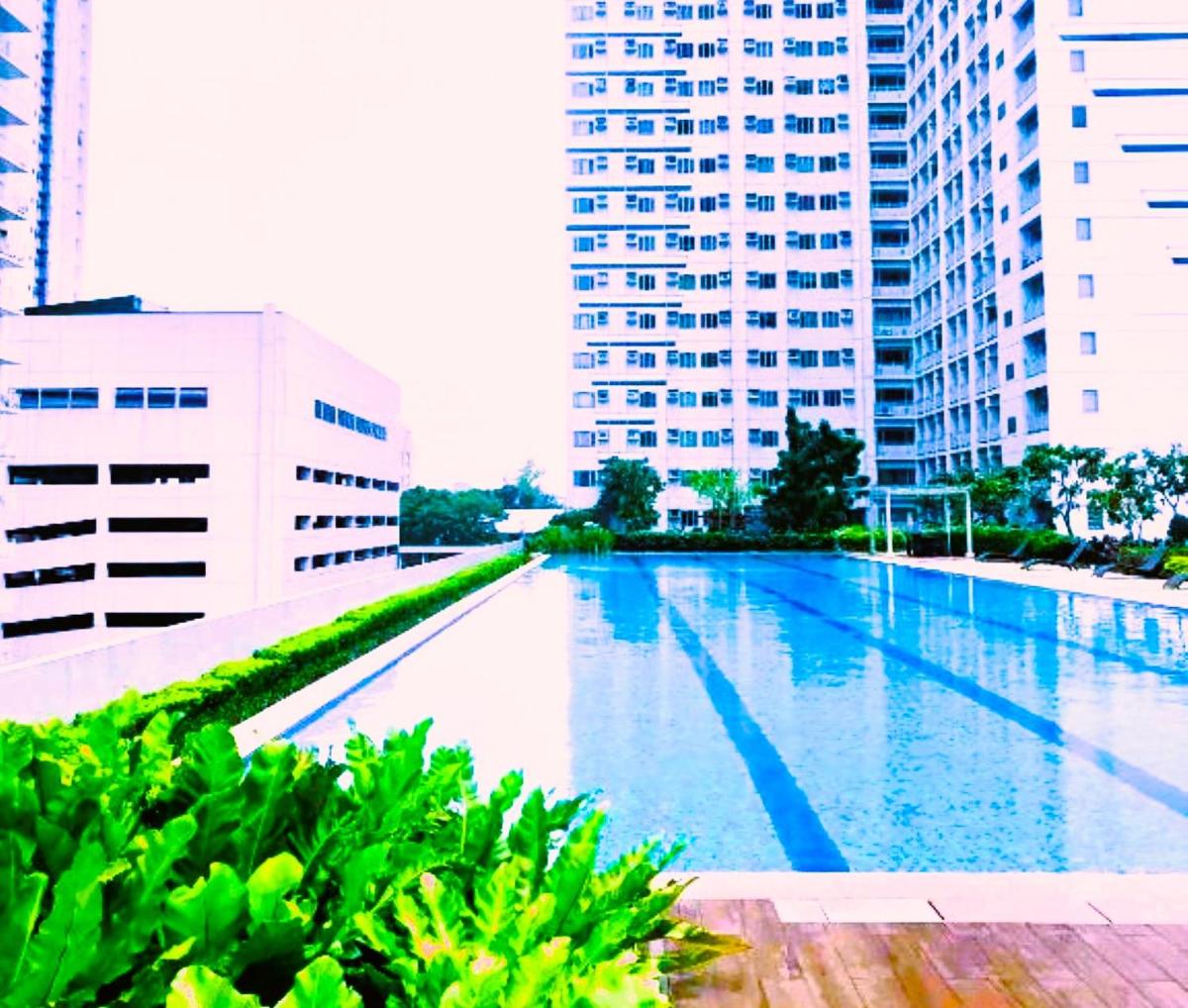 Suitetrails - THE PROMENADE SHOPPING DISTRICT Grass Residences QC MANILA