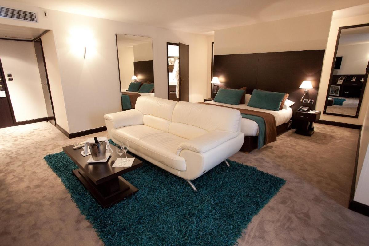 Un ou plusieurs lits dans un hébergement de l'établissement Hotel Palladia