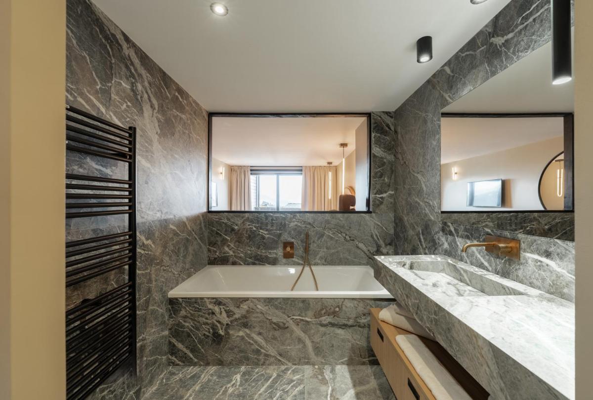 Salle de bains dans l'établissement Fahrenheit Seven Courchevel