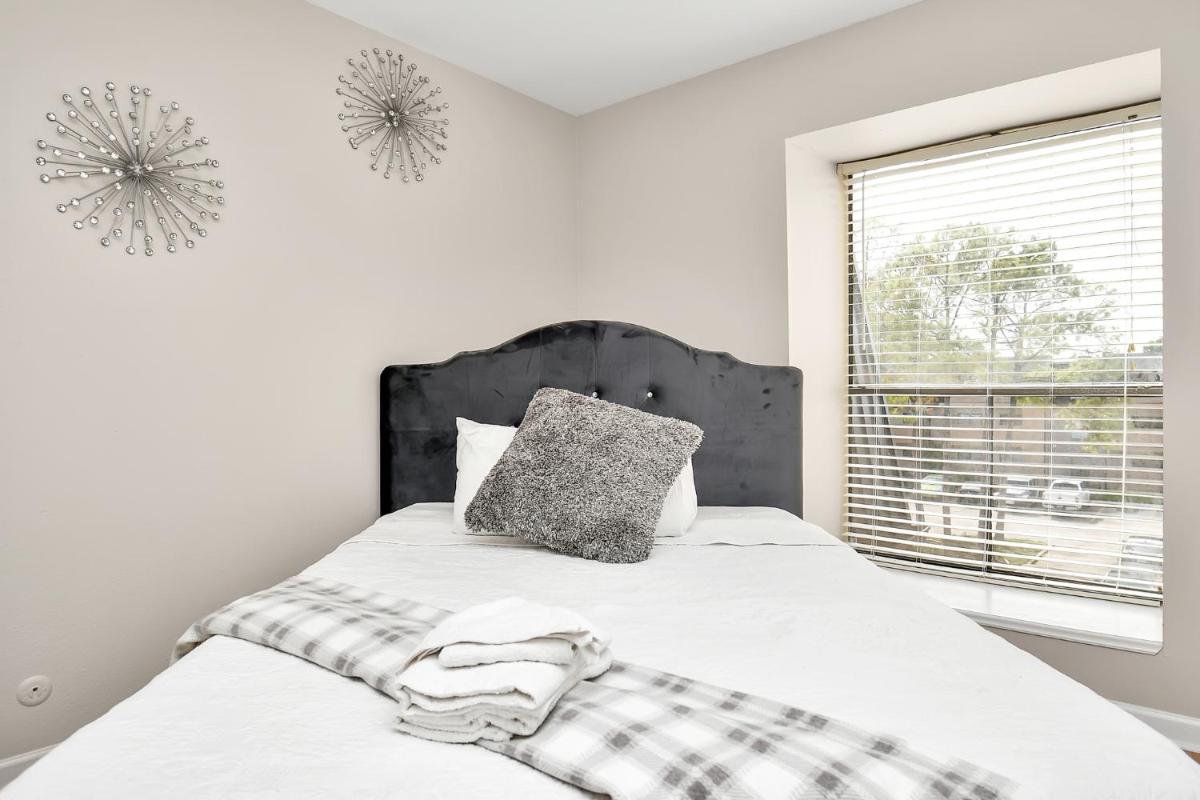 Serenity in Grey: Queen Bedroom - Housity