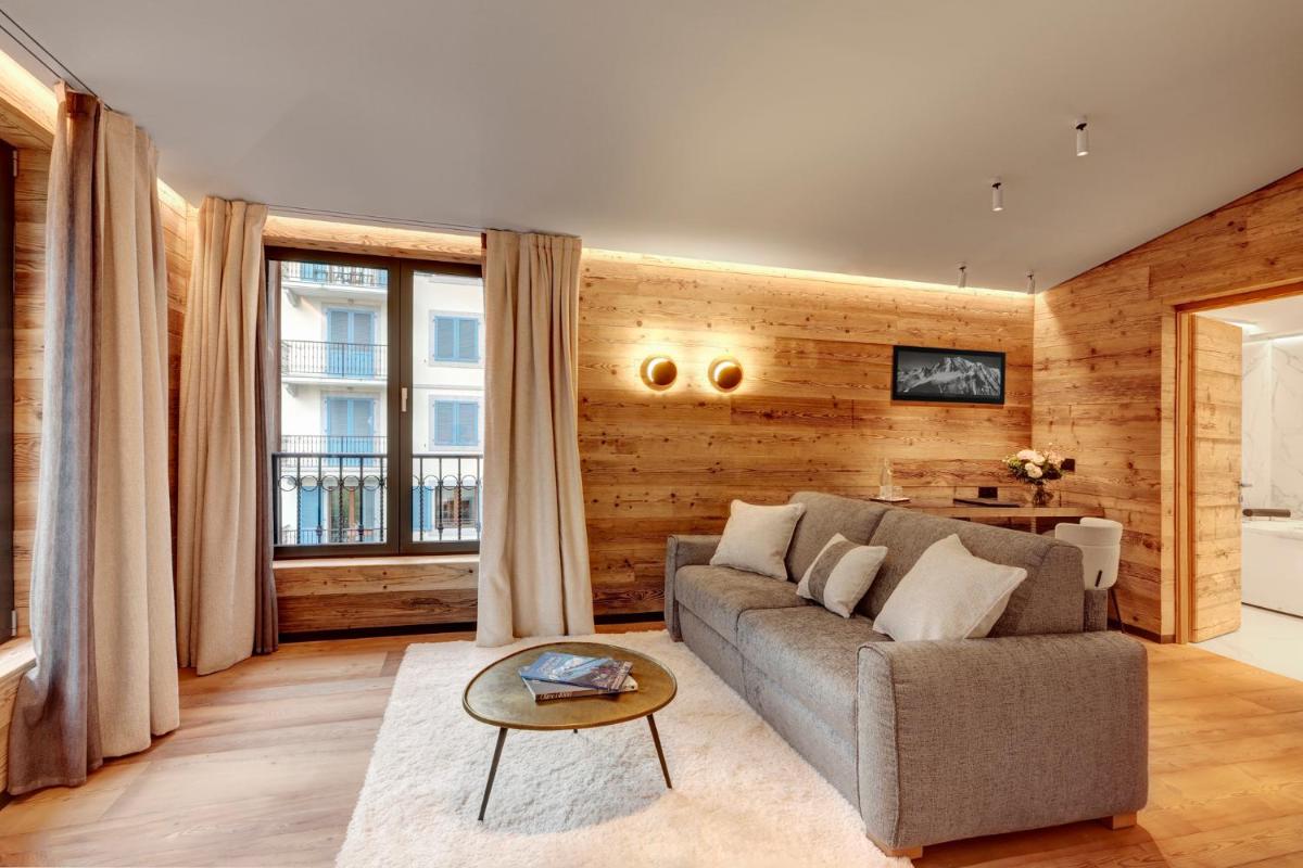 Coin salon dans l'établissement Grand Hôtel des Alpes