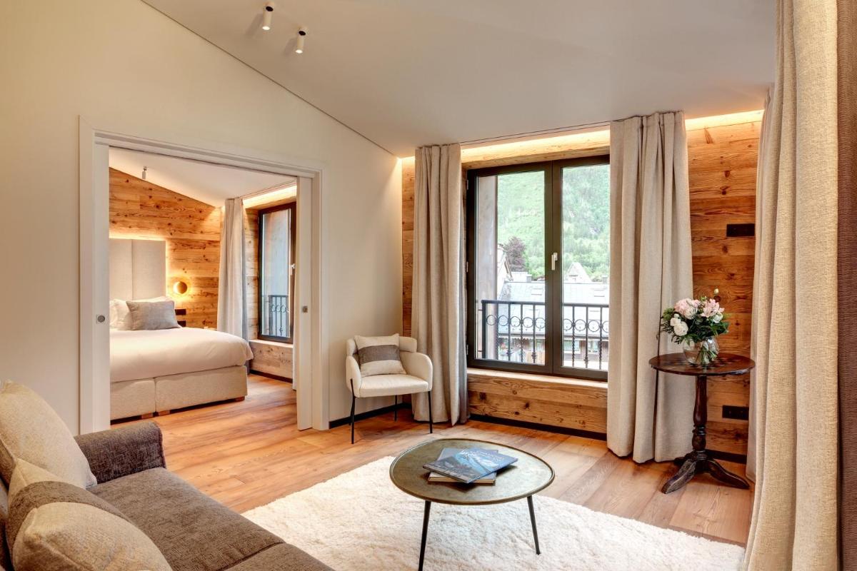 Un ou plusieurs lits dans un hébergement de l'établissement Grand Hôtel des Alpes