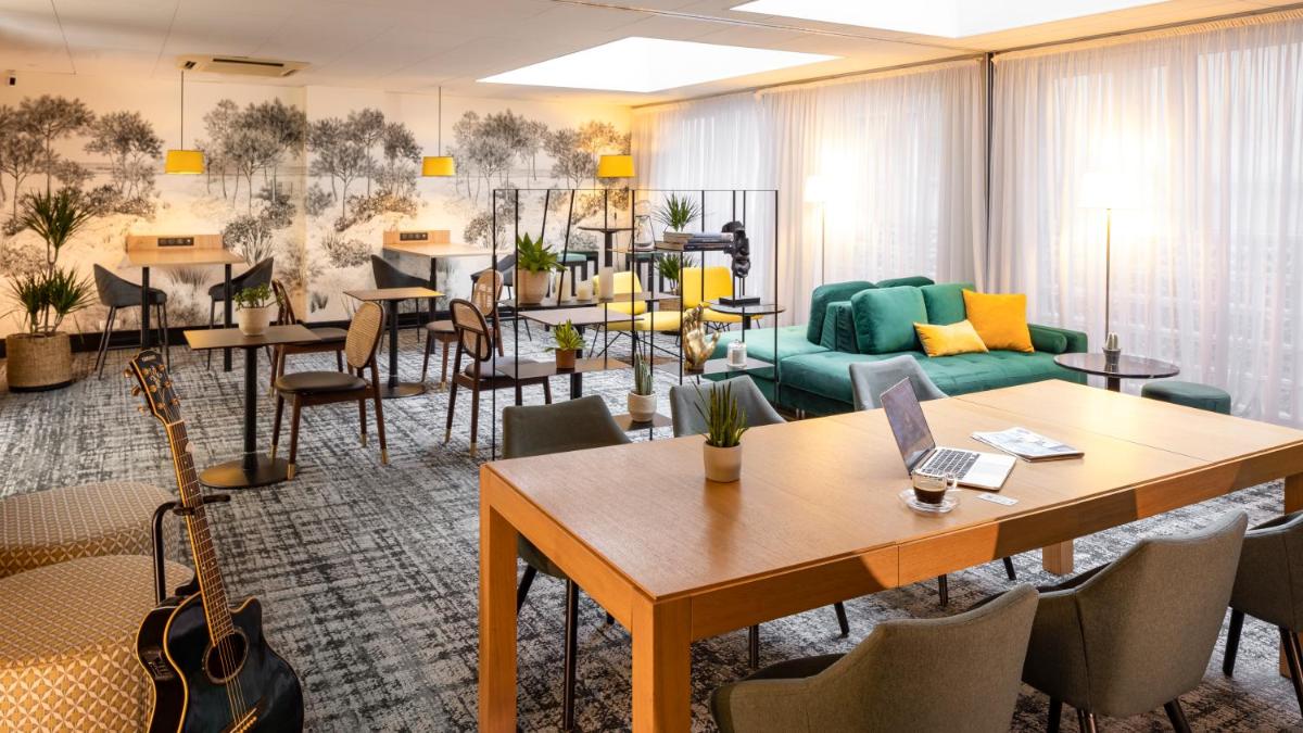 Coin salon dans l'établissement Hotel Residence Europe & Spa