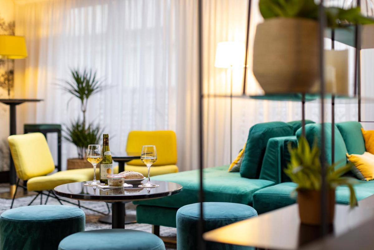 Coin salon dans l'établissement Hotel Residence Europe & Spa