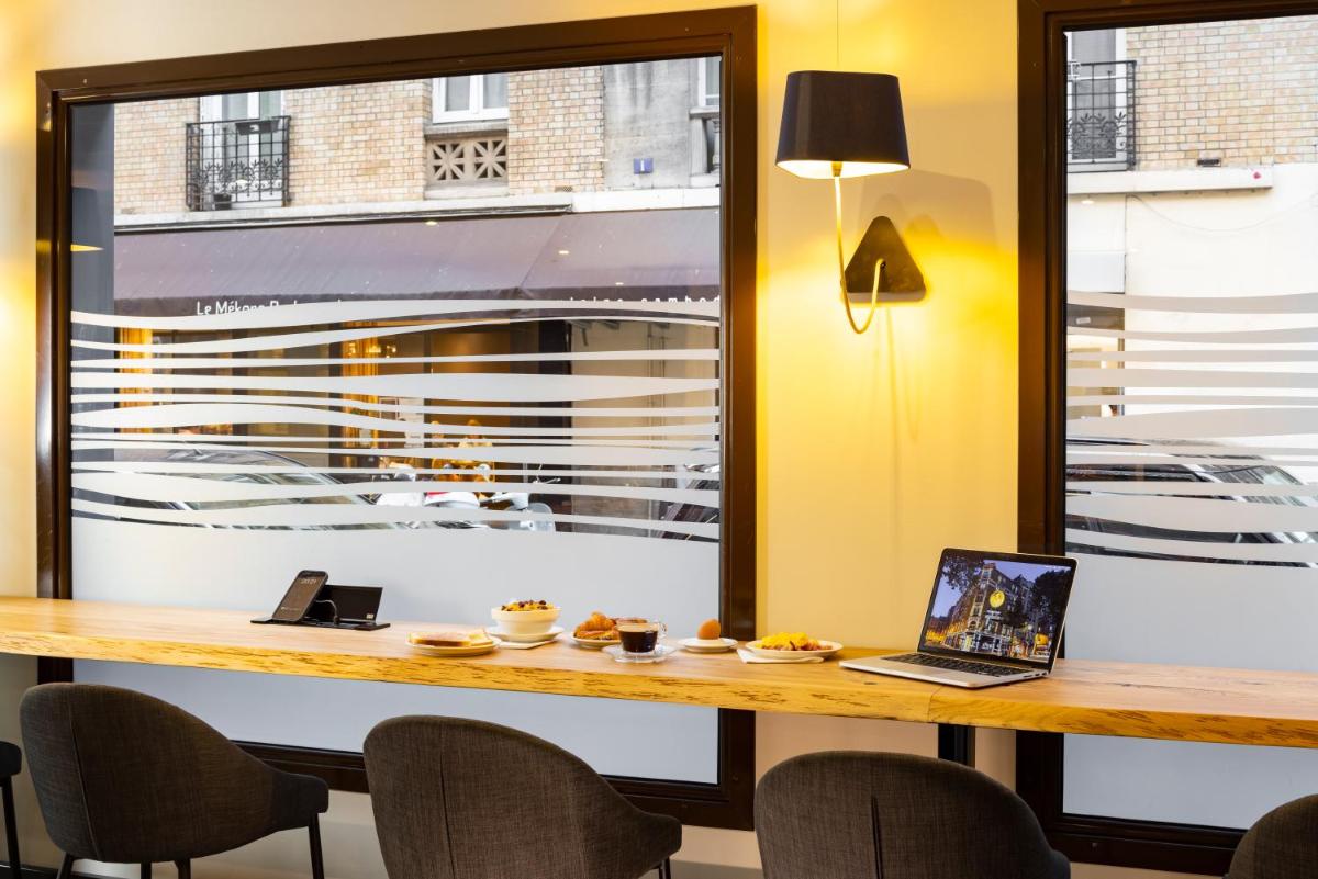Télévision ou salle de divertissement dans l'établissement Hotel Residence Europe & Spa