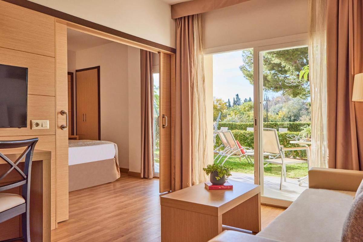Cama o camas de una habitación en Zafiro Tropic