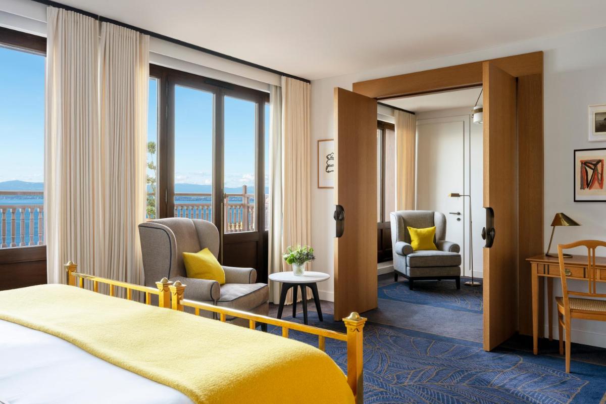 Un ou plusieurs lits dans un hébergement de l'établissement Hôtel Royal