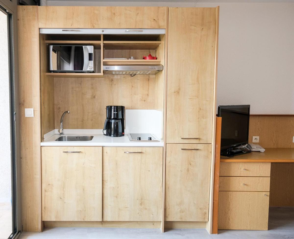 Cuisine ou kitchenette dans l'établissement Thalazur Antibes - Résidence & Spa