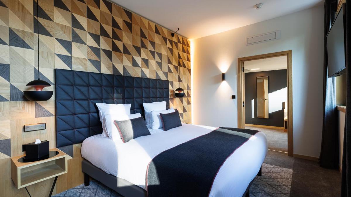 Un ou plusieurs lits dans un hébergement de l'établissement Domaine de Dolomieu Hotel & Spa - BW Premier Collection