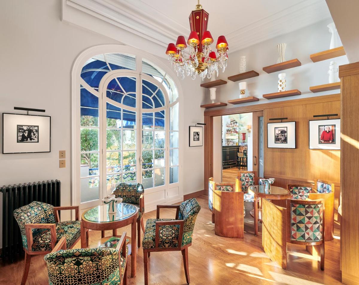 Coin salon dans l'établissement Hôtel Belles Rives