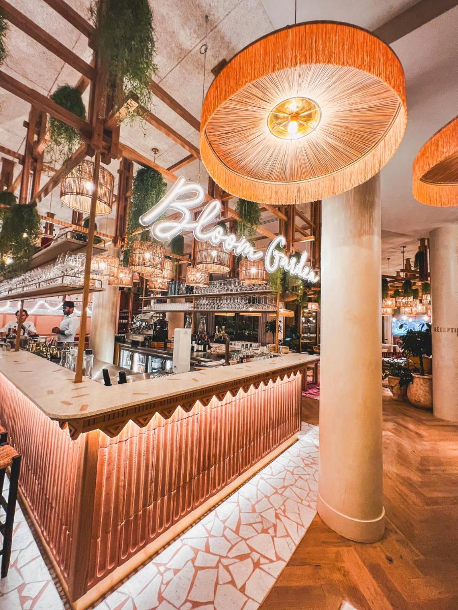 Restaurant ou autre lieu de restauration dans l'établissement Bloom House Hôtel & SPA