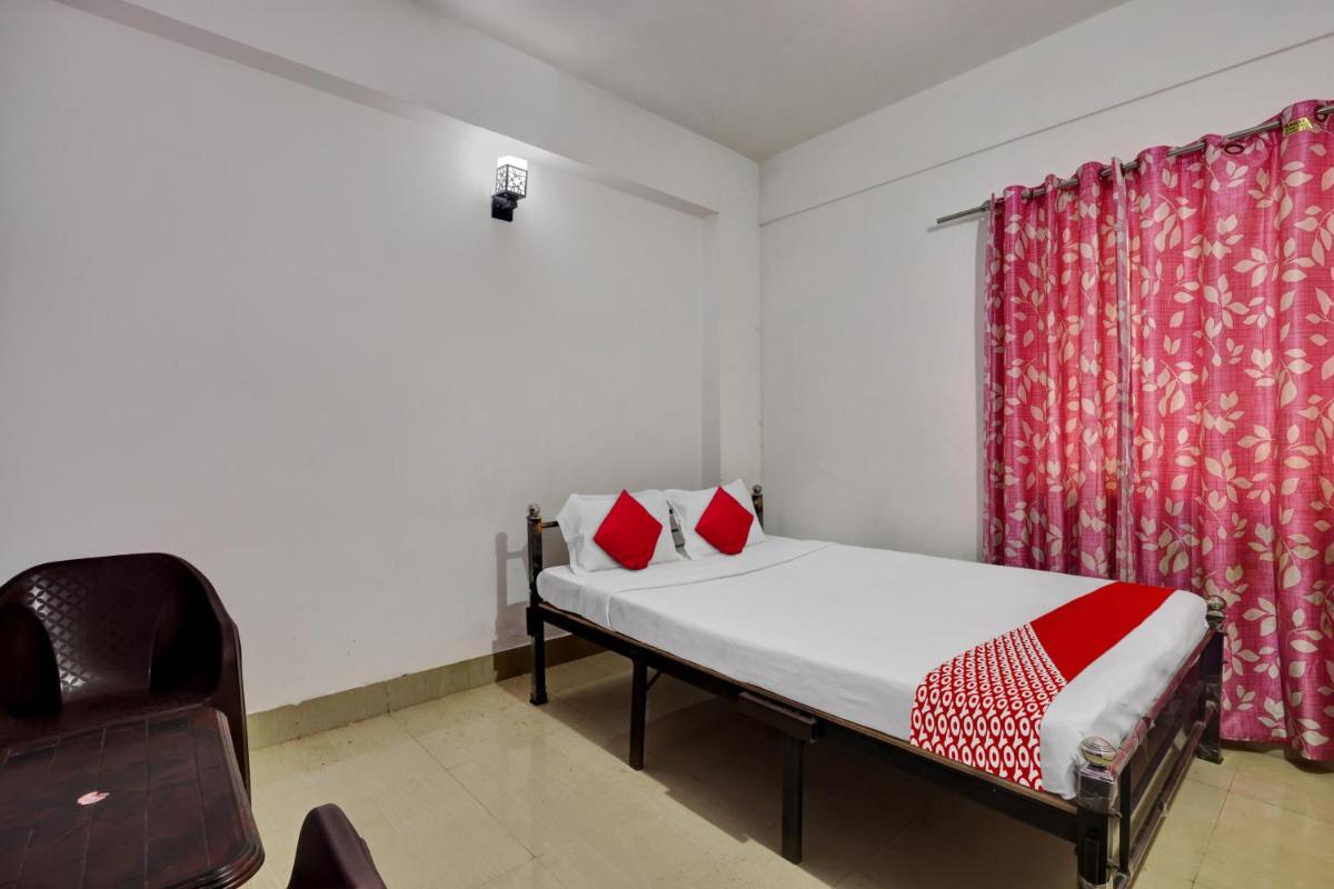 OYO Flagship Happy Inn - Housity