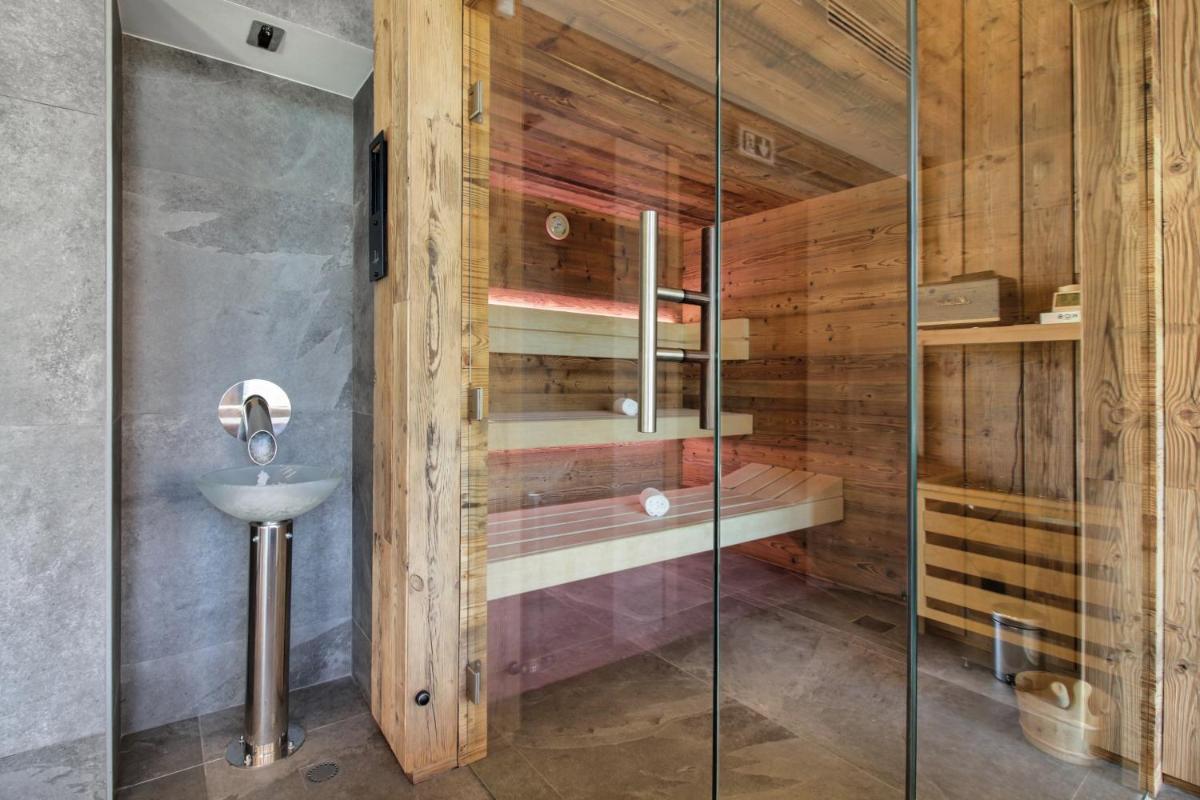 Un ou plusieurs lits dans un hébergement de l'établissement Pure Montagne Resort & Spa