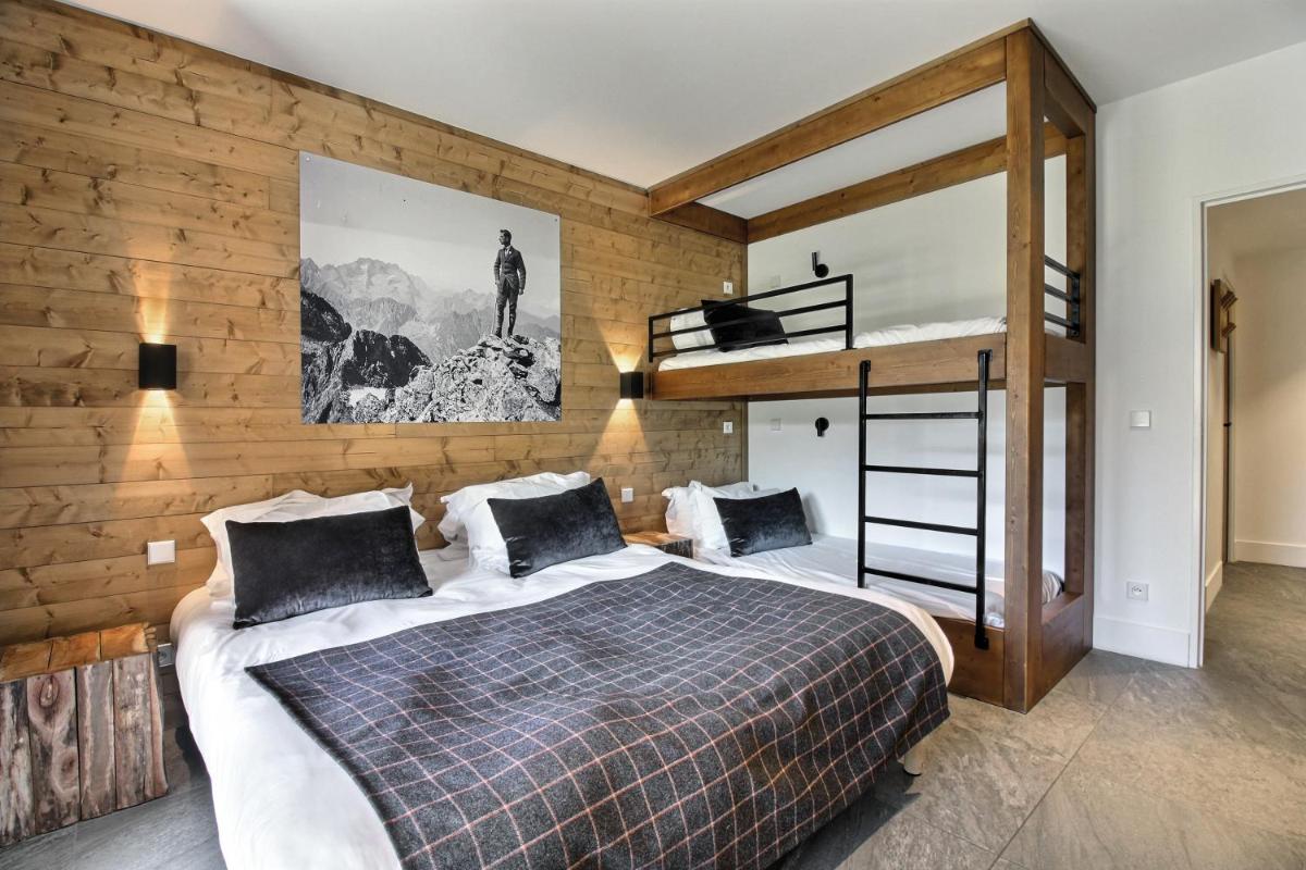 Un ou plusieurs lits dans un hébergement de l'établissement Pure Montagne Resort & Spa