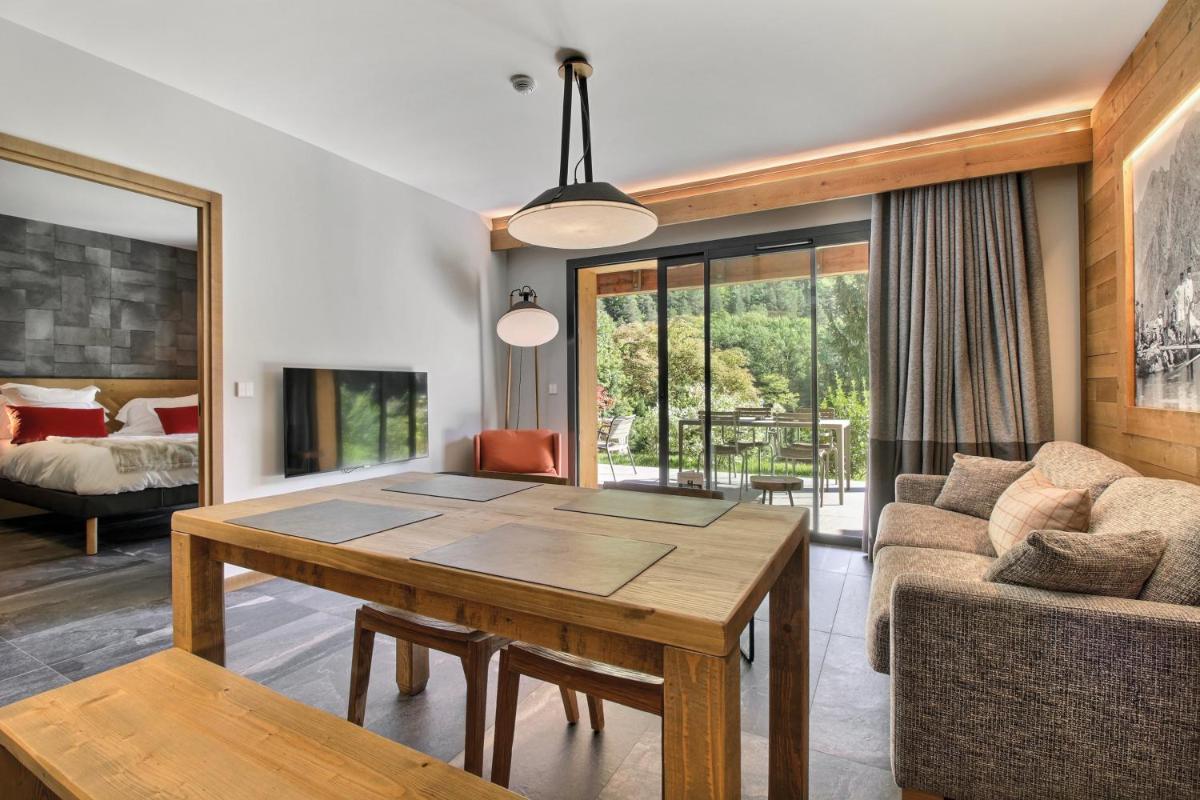 Un ou plusieurs lits dans un hébergement de l'établissement Pure Montagne Resort & Spa