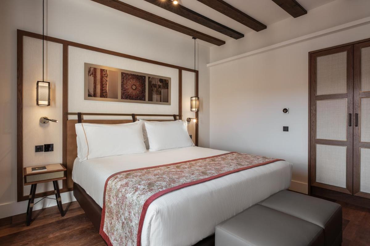 Cama o camas de una habitación en Áurea Toledo by Eurostars Hotel company
