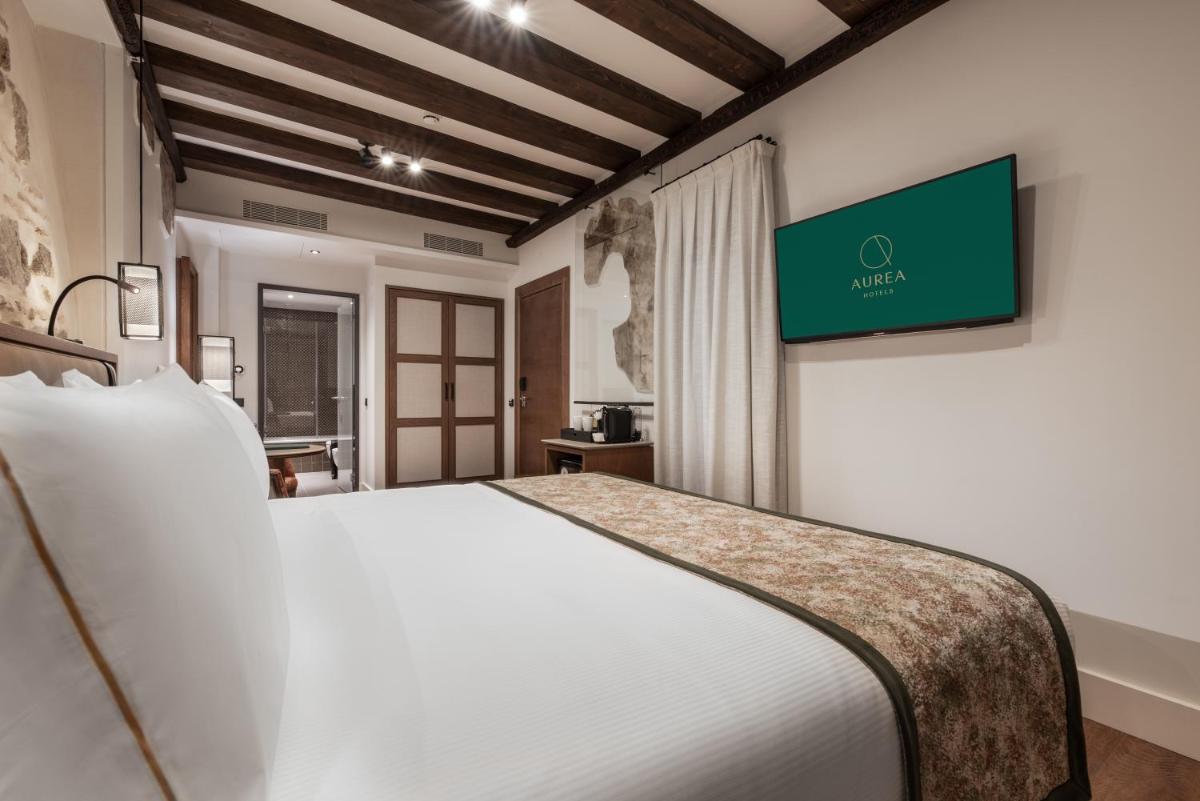 Cama o camas de una habitación en Áurea Toledo by Eurostars Hotel company
