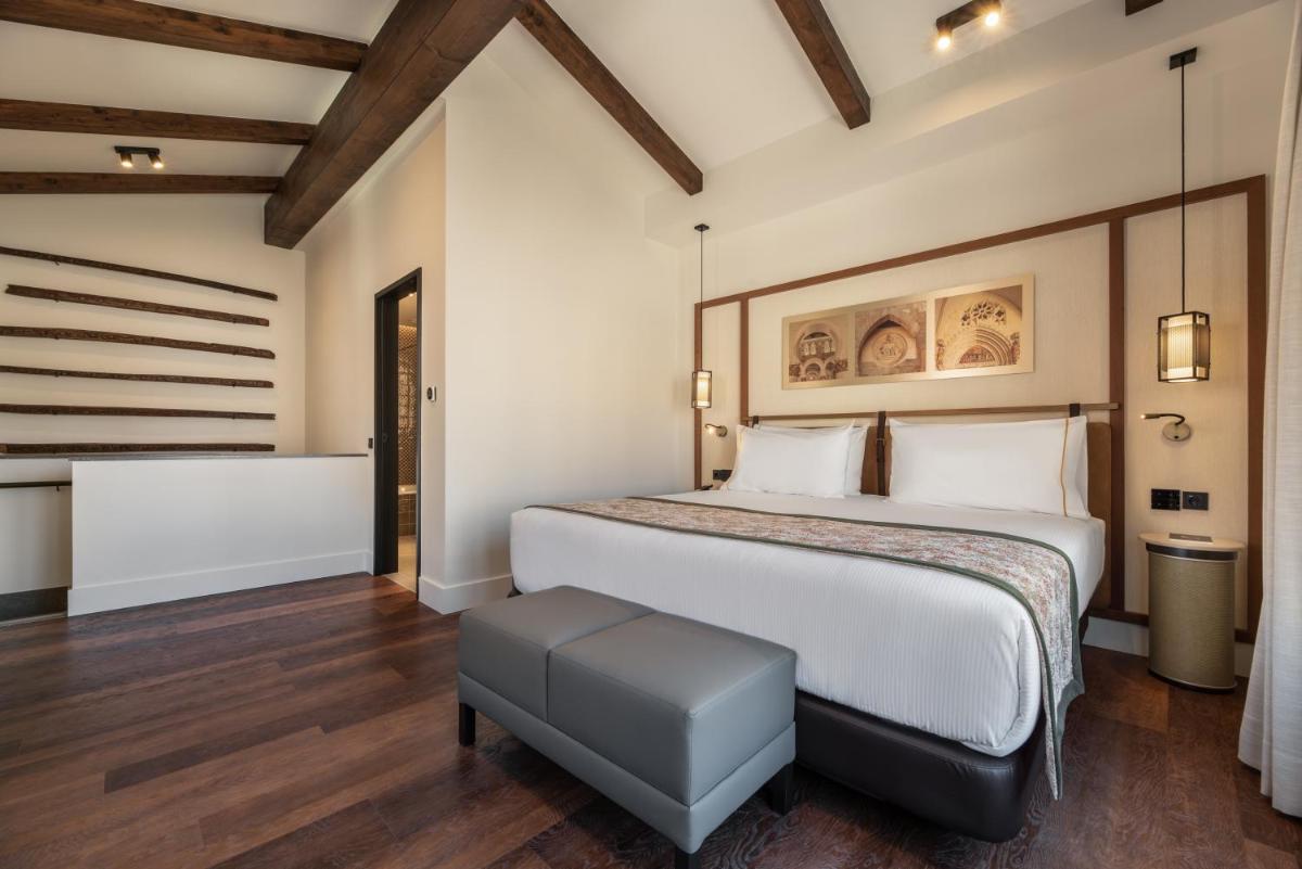 Cama o camas de una habitación en Áurea Toledo by Eurostars Hotel company