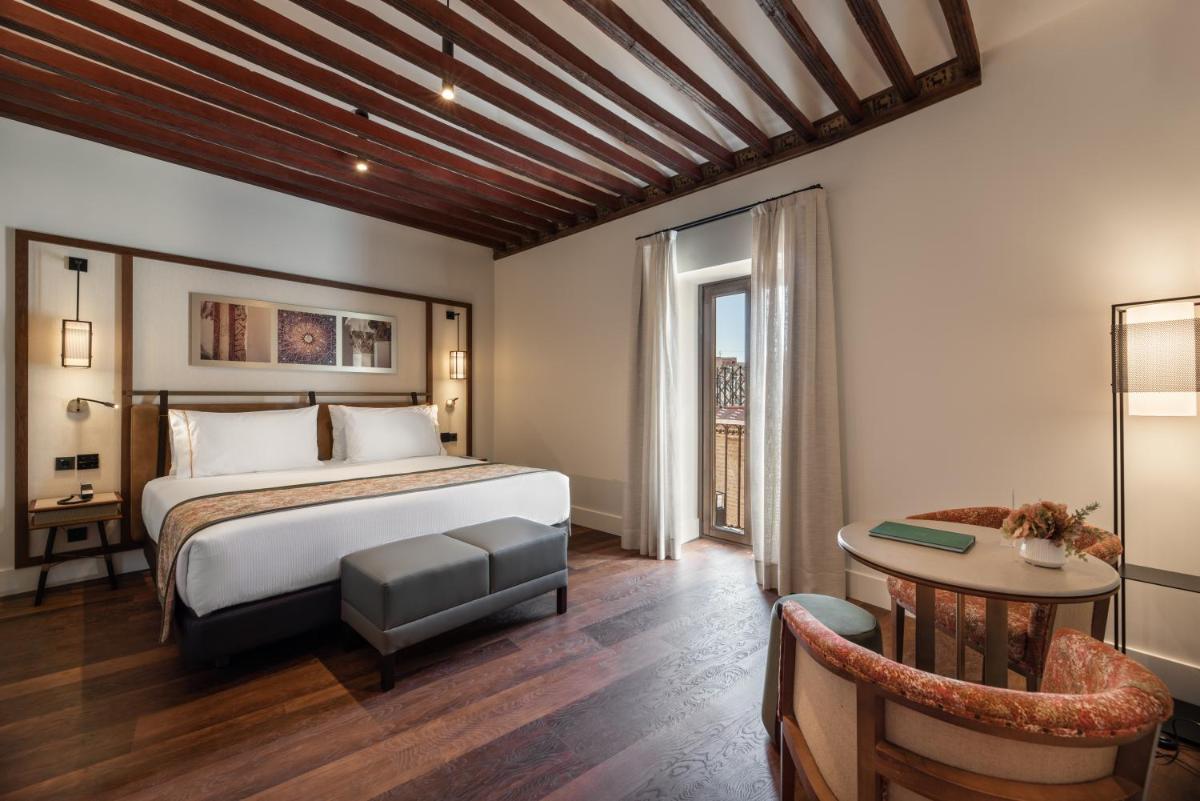 Cama o camas de una habitación en Áurea Toledo by Eurostars Hotel company