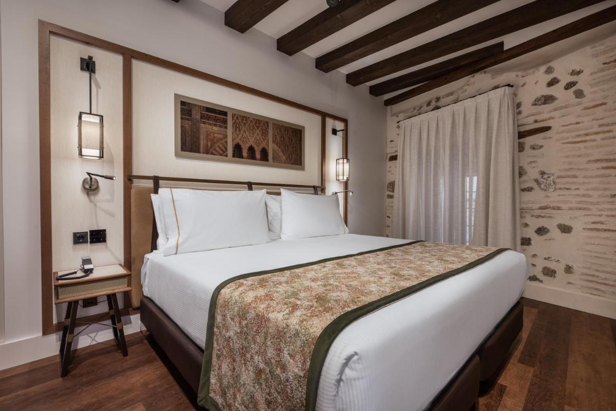 Cama o camas de una habitación en Áurea Toledo by Eurostars Hotel company