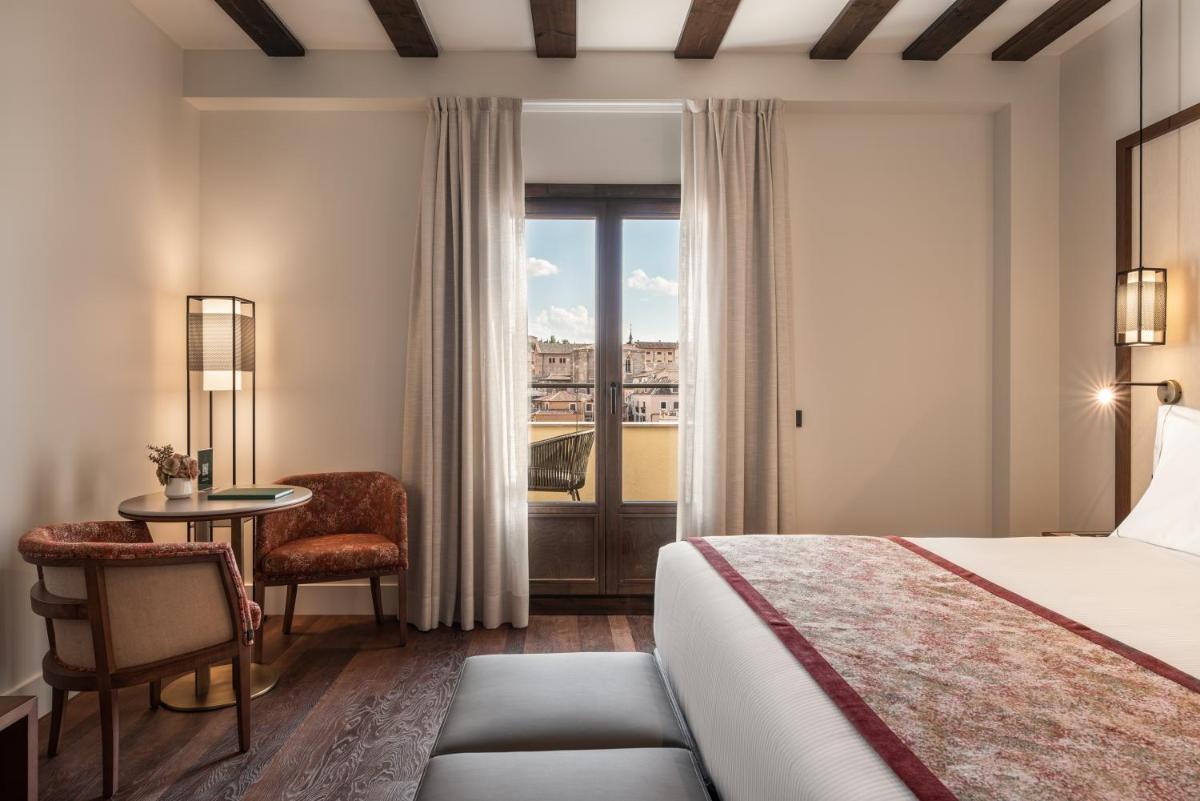Cama o camas de una habitación en Áurea Toledo by Eurostars Hotel company