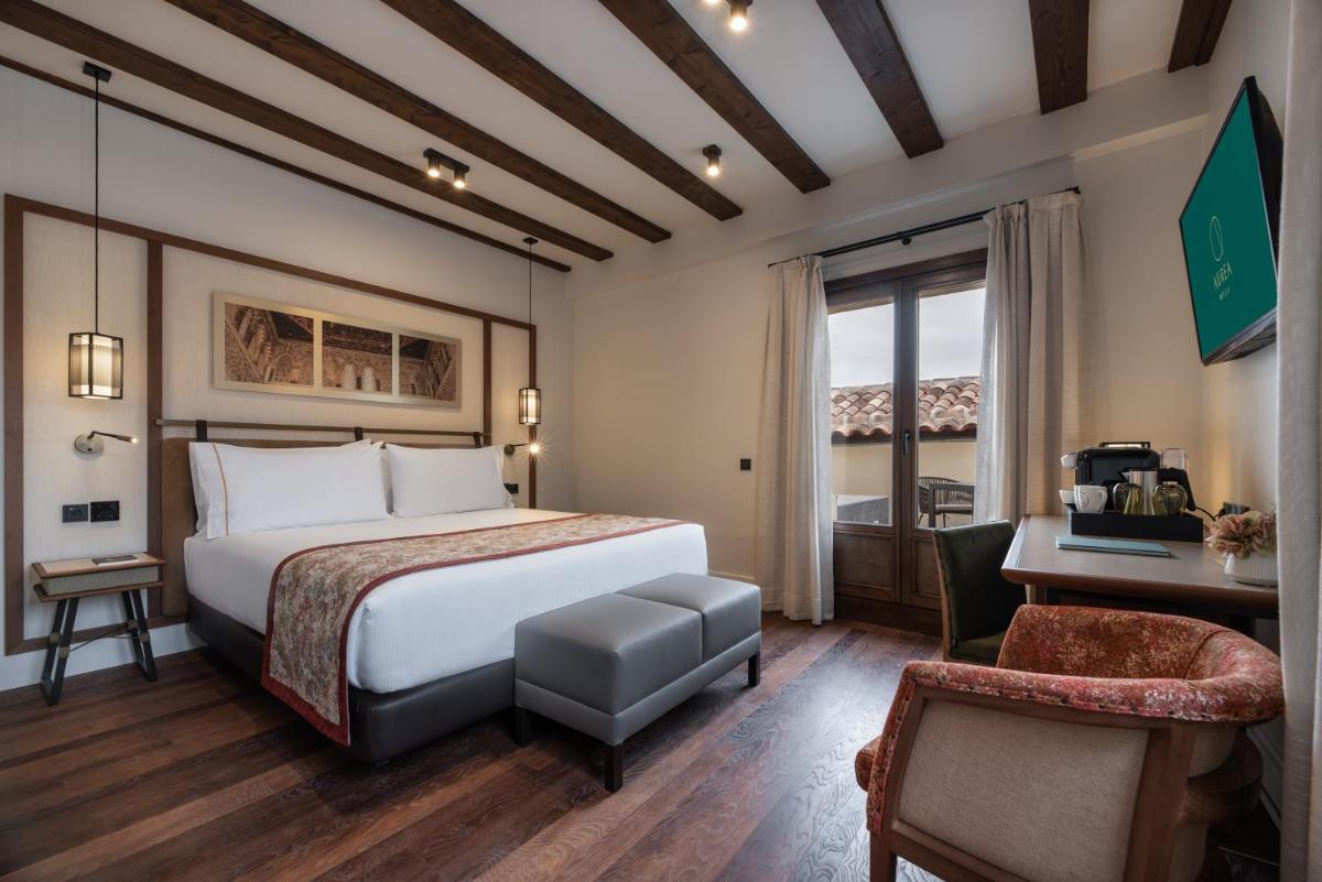 Cama o camas de una habitación en Áurea Toledo by Eurostars Hotel company