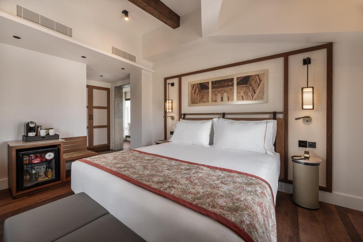 Cama o camas de una habitación en Áurea Toledo by Eurostars Hotel company