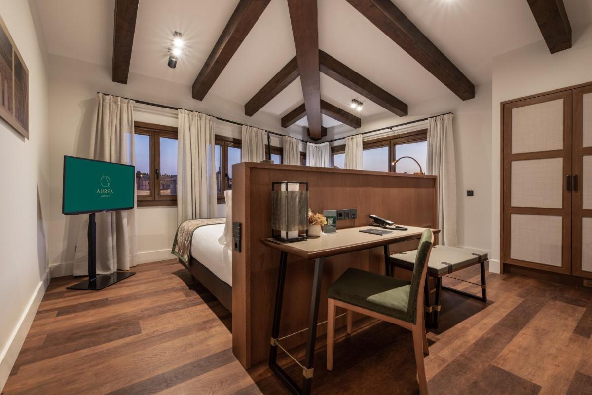 Cama o camas de una habitación en Áurea Toledo by Eurostars Hotel company