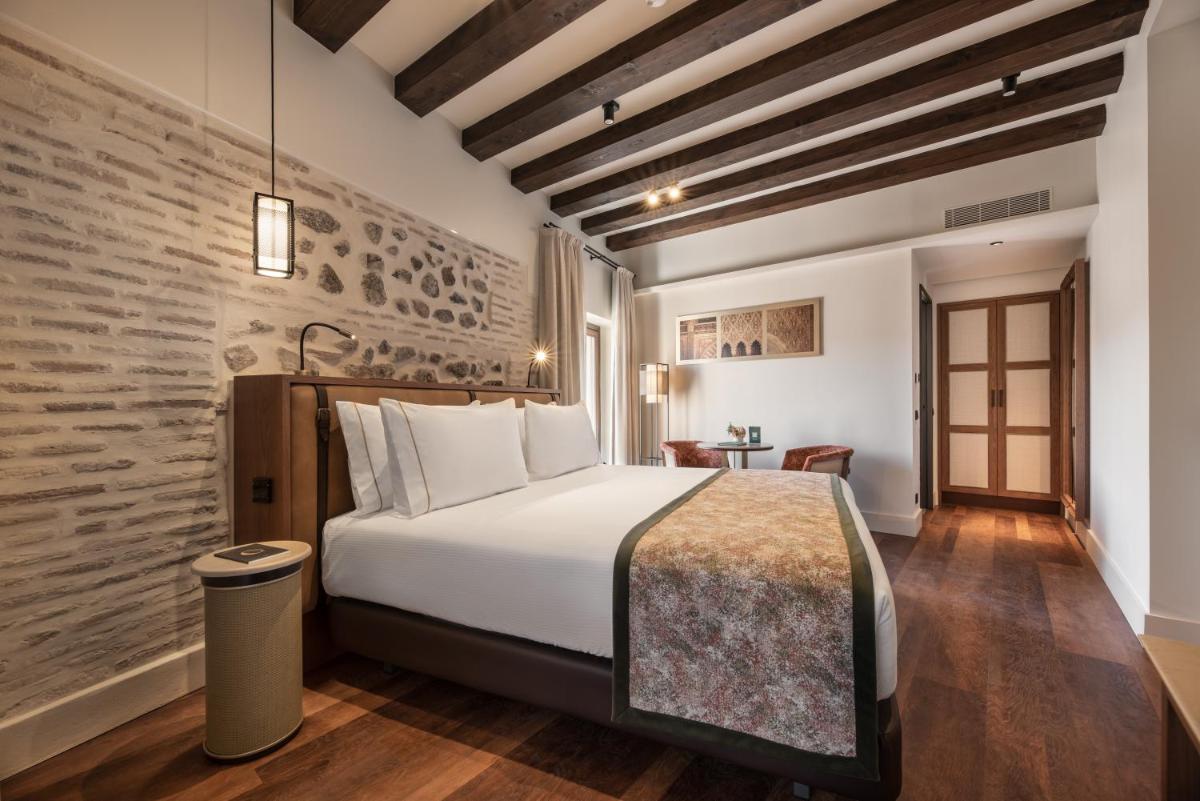 Cama o camas de una habitación en Áurea Toledo by Eurostars Hotel company