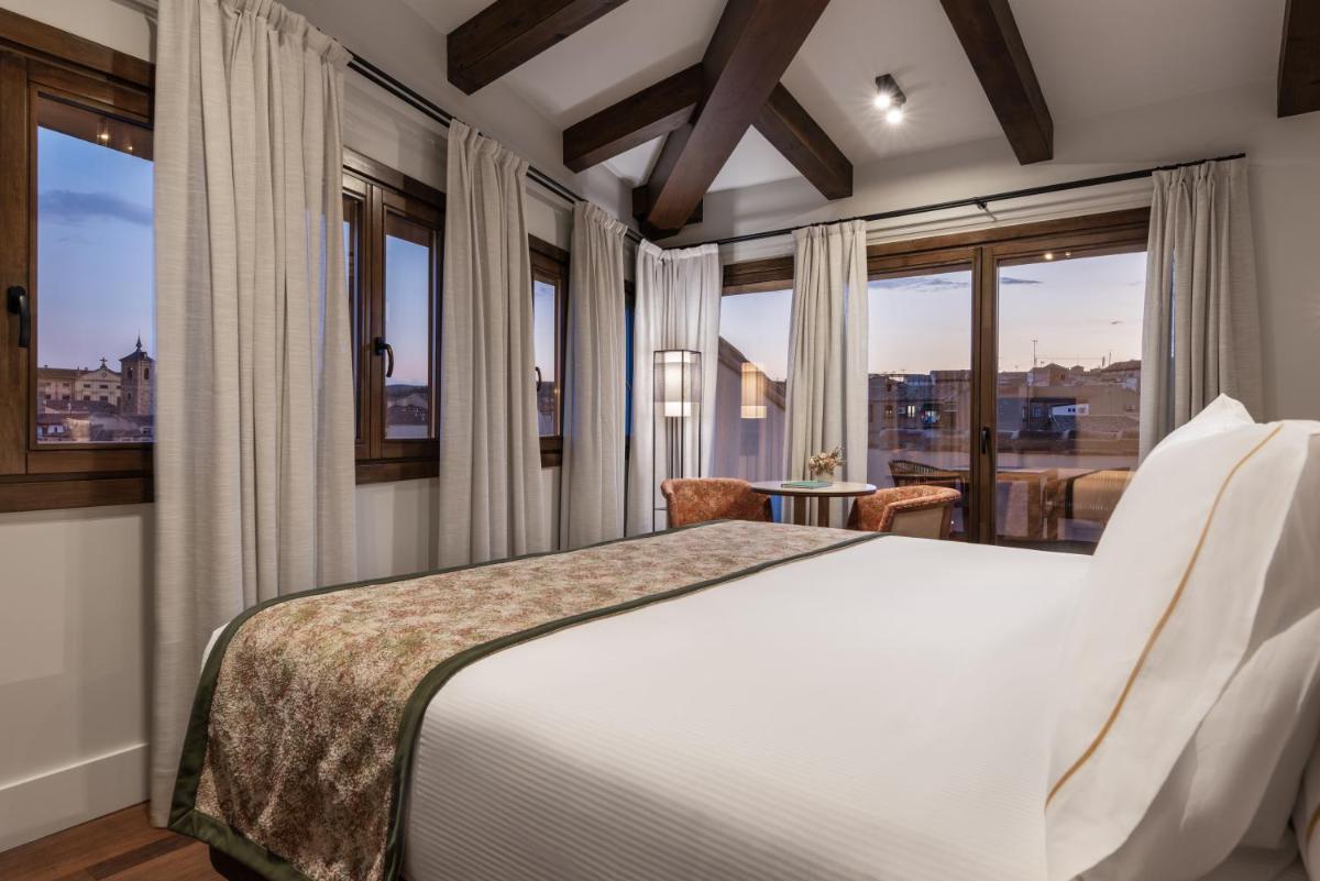Cama o camas de una habitación en Áurea Toledo by Eurostars Hotel company