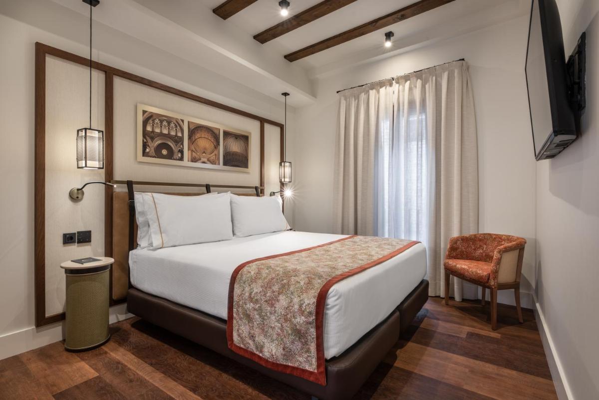 Cama o camas de una habitación en Áurea Toledo by Eurostars Hotel company