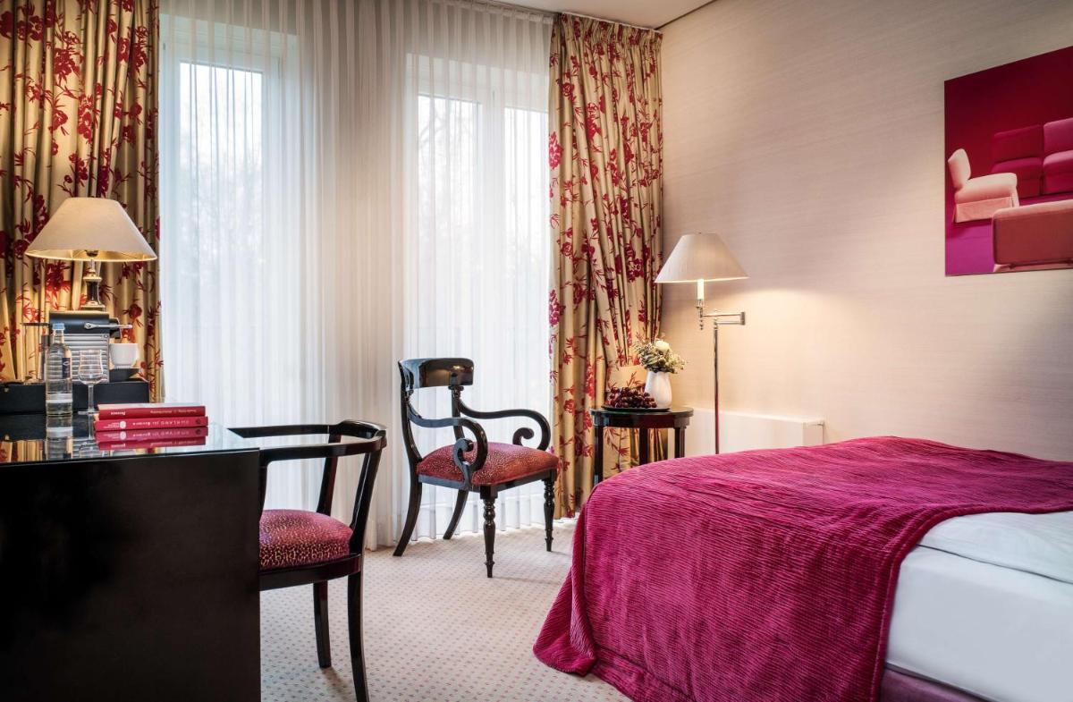 Ein Bett oder Betten in einem Zimmer der Unterkunft Parkhotel Bremen – ein Mitglied der Hommage Luxury Hotels Collection
