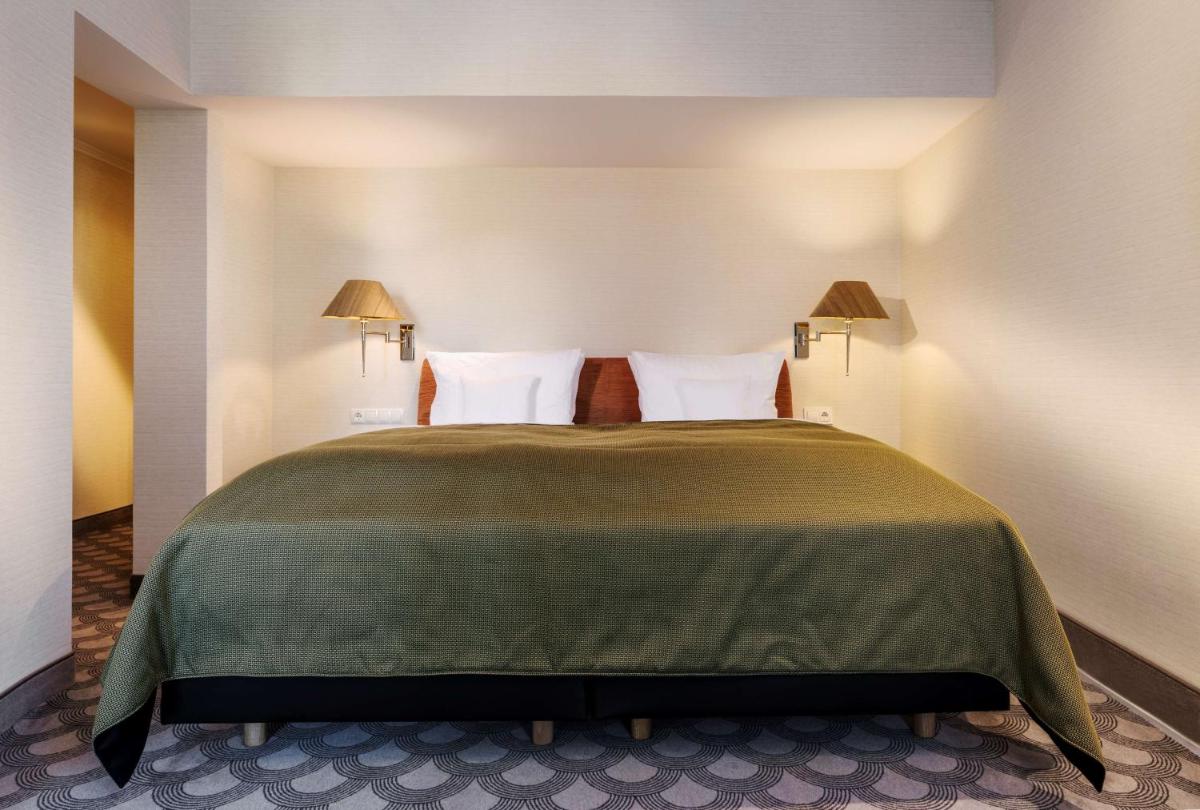 Ein Bett oder Betten in einem Zimmer der Unterkunft Parkhotel Bremen – ein Mitglied der Hommage Luxury Hotels Collection