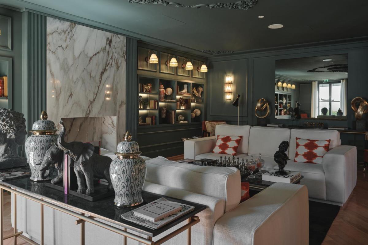 Uma área de estar em GA Palace Hotel & Spa, a XIXth-Century Villa